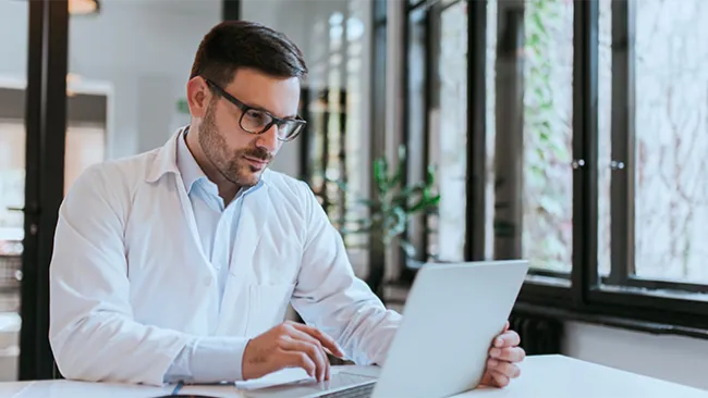 Man looking at laptop
