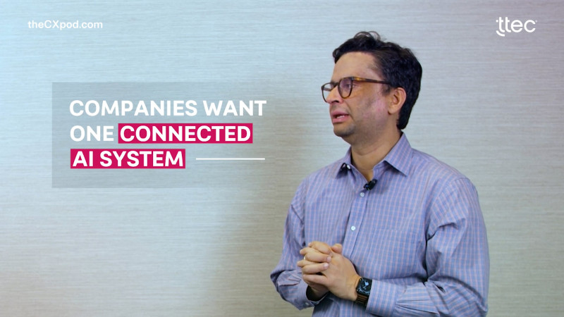 CEO side profile interview snapshot with text "companies want one connected AI system" next to him